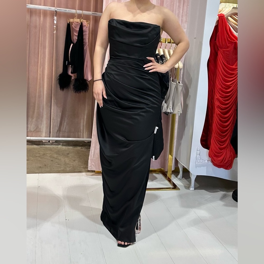 Long black dress with slit on the left side